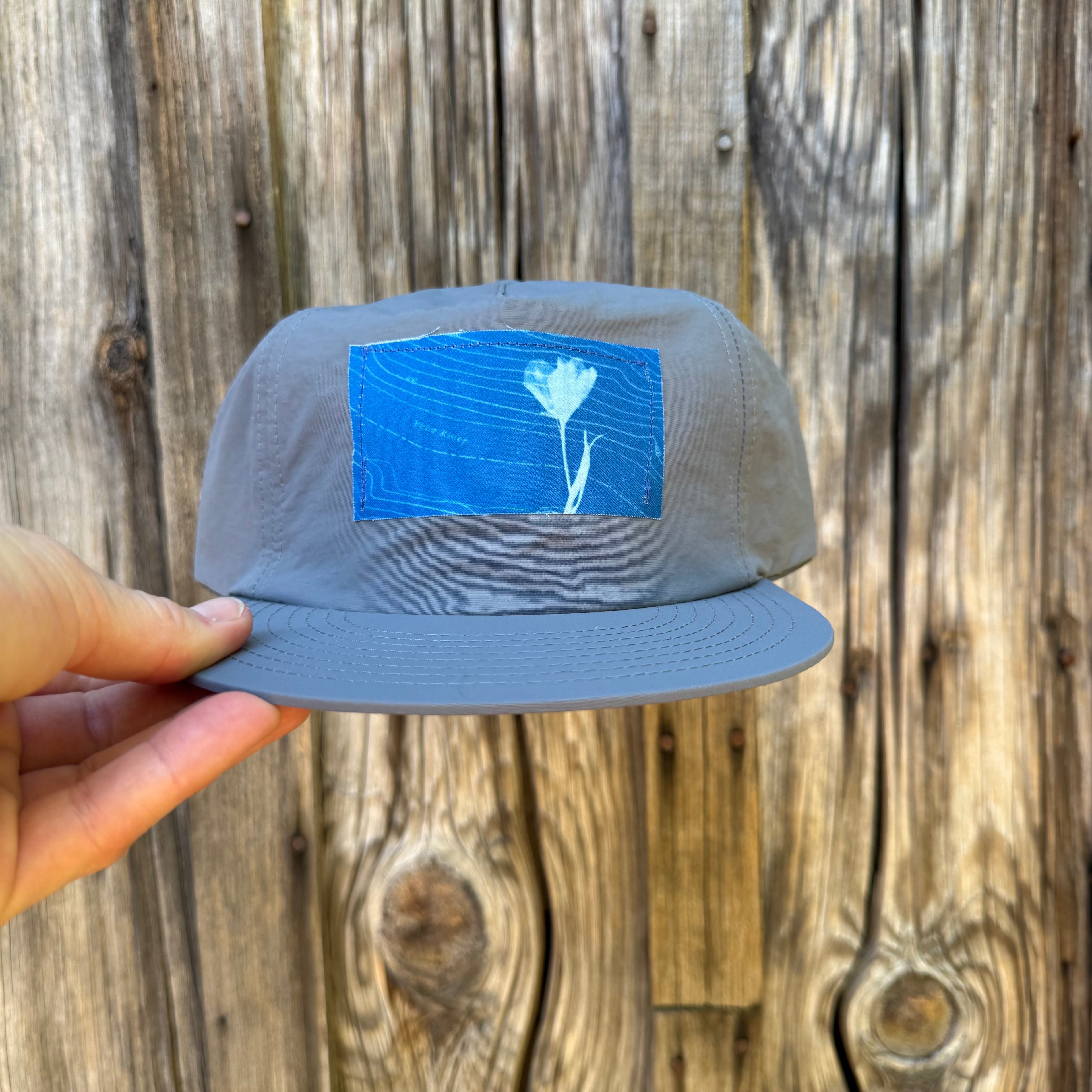 Nylon Light Blue Hat: Wildflower + Yuba River Topo